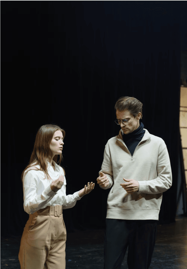 actor and actress on stage